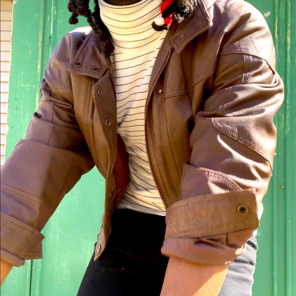 Wilson’s brown leather jacket
